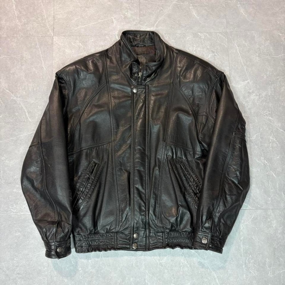 1990's Black leather bomber jacket with a streetwear vibe
